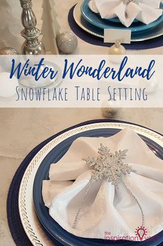 winter wonderland snowflake table setting with blue and white plates, napkins and silverware