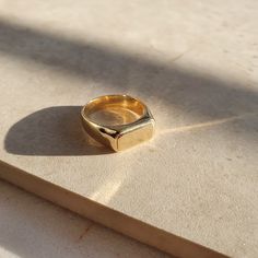 This is a one-of-a-kind piece and genderless ring made with Recycled Silver 925 and Gold Vermeil. The ring comes without engraving, but if you would like it engraved, please just follow our listing for engraving: https://www.etsy.com/uk/listing/1142303650/monogram-engraving Material: Sterling Silver 925 and Gold Vermeil Gold vermeil is a high-quality form of gold plating in which a thick layer of gold ( 10 microns of 18k gold) is coated upon sterling silver. It has a 1-year guarantee and lifetim Class Rings, Cotton Pouch, Recycled Silver, One Ring, Etsy Fashion, Signet Ring, Gold Style, Silver Band, Gold Plating