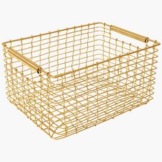 a gold wire basket with handles on the bottom and sides, in front of a white background