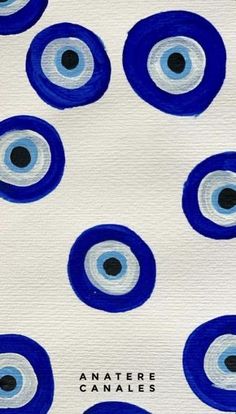 an image of blue and white circles with black dots on the bottom, in front of a white background