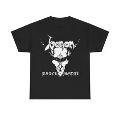 a black t - shirt with an image of a demon on it