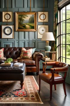 a living room filled with furniture and pictures on the wall above it's windows