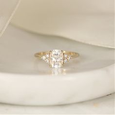 a diamond ring with three stones on it