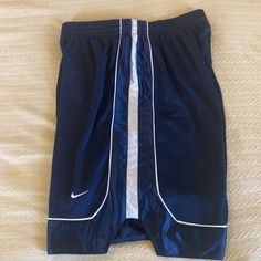 Nwot Nike Navy And White Mesh Shorts L Navy With White Trim Basketball Shorts. Mesh Body Trimmed With Regular Material. Well Made. No Pockets. Never Worn Excellent Condition Casual Navy Nike Athletic Shorts, Nike Navy Shorts For Summer, Sporty Blue Basketball Shorts, Moisture-wicking Athletic Shorts For Basketball, Athletic Shorts With Built-in Shorts For Basketball, Nike Moisture-wicking Athletic Shorts For Basketball, Moisture-wicking Basketball Athletic Shorts, Mesh Shorts, White Mesh