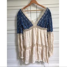 Well Made Free People Dress. This Dress Is Very Thick And Heavy. The Lace And Pattern On This Dress Is High Quality But Fragile. Beautiful Color And Fits Well. Zips On The Side And Ties In The Back. Never Worn. Flowy Long Sleeve Mini Dress For Beach Cover-up, Flowy Long Sleeve Mini Dress For Beach, Cream Long Sleeve Beach Cover-up Dress, Blue Long Sleeve Mini Dress With Lace Trim, Long Sleeve Blue Mini Dress With Lace Trim, Cream Long Sleeve Mini Dress For Beach, Blue Bohemian Mini Dress With Lace Trim, Bohemian Blue Mini Dress With Lace Trim, Long Sleeve Boho Dress With Lace Trim For Vacation