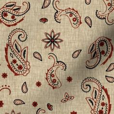 a white and red paisley print fabric with black, red, and blue designs on it