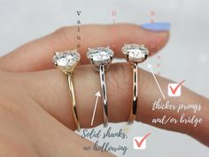 three different types of engagement rings on someone's hand with the names and measurements