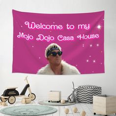 a pink wall tapestry with the words welcome to my major dojo casa house