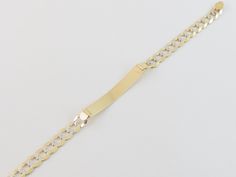 "Wonderful 14k Solid Yellow And White Gold Men's Cuban Link ID Bracelet!! Metal Purity: 14k gold , Stamped Length: 8\" , 8 1/2\" long Width: Almost 3/8\" or 7 mm wide Length and avg weight: 8\"= 10.6 g , 8 1/2\"= 11.3 g Closure: Lobster clasp Complementary Gift box Engraving is available for a name and a date. The font will be in print letters. This bracelet is made in USA and Cuban is Just the name of the style. Images may be enlarged to show detail and the item may look larger than it appears Elegant Curb Chain Name Bracelet For Formal Occasions, Formal Engraved Cuban Link Jewelry, Elegant Formal Name Bracelet With Curb Chain, Formal White Gold Curb Chain Bracelet, Gold Nameplate Curb Chain Bracelet, Classic White Gold Bracelet With Curb Chain, 14k Hallmarked Yellow Gold Bracelet, Yellow Gold Bracelet With Curb Chain And Nameplate, 14k Gold Bracelet With Curb Chain And Nameplate