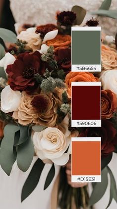 a wedding bouquet with flowers and greenery in shades of red, orange, green