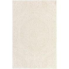 a white rug with an intricate design on the front and back side, in various sizes