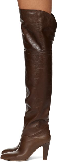 Over-the-knee grained calfskin boots in brown. · Pointed toe · Lace up detailing at back collar · Covered stiletto heel with rubber injection · Leather sole · Heel: H3.5 Supplier color: Sooty brown Fitted Brown Calf Leather Knee-high Boots, Luxury Brown Knee-high Heeled Boots, Brown Calf Leather Knee-high Boots For Fall, Classic Brown Knee-high Heeled Boots, Fall Brown Calf Leather Knee-high Boots, Formal Brown Knee-high Boots With Leather Sole, Elegant Brown Mid-calf Boots With Leather Lining, Brown Knee-high Calf Leather Heeled Boots, Luxury Brown Knee-high Boots With Leather Lining