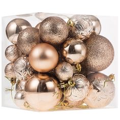 a box filled with gold and silver ornaments