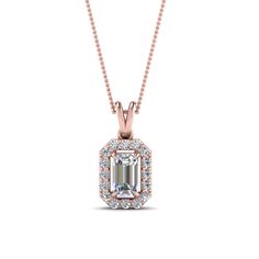 This Halo Fancy Diamond Pendant adds pristine beauty with the beautiful emerald cut diamond with immaculate brilliance held in a classic four prong setting enveloped beautifully by an array of small sparkling round shaped stones studded on a spectacular halo pattern. This diamond pendant is held on a glossy and polished V loop that is hung on a delicate chain accentuating your appeal in an aesthetic manner.  Emerald and round cut stones of 0.37 Total Carat Weight in a prong setting. Total Number of Stones:- 17 This halo diamond fancy pendant can also be acquired in a wide variety of lustrous metals and gemstones. Free shipping within USA. Direct manufacturing prices. Easy Returns With Lifetime Upgrade. Guaranteed lower diamond price than any other source, check via the diamond price m Fancy Diamond Pendant, Versace Wallpaper, Fancy Pendant, Emerald Cut Diamond, Sapphire Pendant, Heart Shaped Diamond, Fancy Diamonds, Delicate Chain, Stone Studs