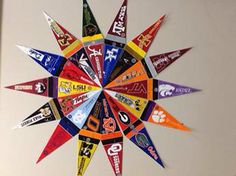 a multicolored paper star hanging on the wall