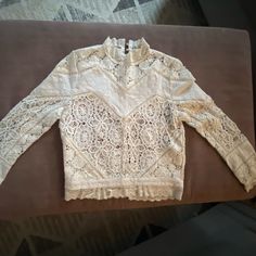 Never Worn - Tags Removed. Still Has Original Sewing Pencil Markings - Easily Removed With A Quick Soak. Still Have The Original Receipt. Fall Party Tops With Lace Work, Fall Feminine Tops With Lace Work, Feminine Lace Work Tops For Fall, Chic Cream Long Sleeve Crochet Top, Feminine Long Sleeve Top With Crochet Lace, Chic Long Sleeve Crochet Top, Chic Long Sleeve Crochet Lace Top, Elegant Crochet Lace Tops For Fall, Fall Cream Tops With Lace Sleeves