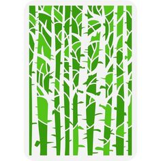 a green and white paper cut design with trees