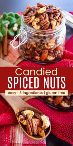 candied spiced nuts in a glass jar with wooden spoons on the side