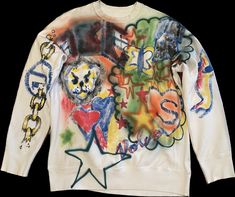 Hand Painted sweater in size men's medium, painted with brush and airbrush with a variety of designs and colours. The sweater fits like a small/medium and is made in Canada.  Please wash cold and hang or flat dry. Winter White Sweatshirt With Graffiti Print, Multicolor Graffiti Print Sweatshirt For Winter, Multicolor Graffiti Print Winter Sweatshirt, Multicolor Sweater For Streetwear, Multicolor Graffiti Print Sweatshirt For Streetwear, Multicolor Long Sleeve Sweatshirt With Graffiti Print, Artistic Graphic Print Sweatshirt For Fall, Airbrushed Clothes, Spray Paint Hoodie