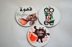 three coasters with coffee designs on them