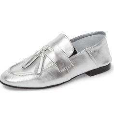 Chic Silver Finish: These loafers feature an elegant silver finish that adds a touch of glamour to any outfit. Classic Round Toe: The round toe design provides both style and comfort, allowing for a roomy fit and a timeless look. Fringe Detail: The Fringe embellishment on the front of the loafers adds a playful and fashionable element to your ensemble. Comfortable Flats: These loafers are designed for all-day comfort, making them perfect for both casual and dressy occasions. Versatile Styling: The silver color and classic design make these loafers versatile, suitable for pairing with a wide range of outfits, from jeans to dresses. Heel height: FlatColor: SilverHandcraftedUS sizing. Fits true to size. Elevate your footwear collection with Silver Loafers for Women Round Toe Flats with Fringe Silver Loafers, Loafer Women, Loafers Style, Tassel Loafers, Comfortable Flats, Toe Designs, Handmade Shoes, Beck, Flat Shoes