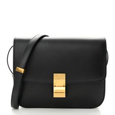 This is an authentic CELINE Box Calfskin Medium Classic Box Flap Bag in Black. This bag is crafted of calfskin leather in black. This shoulder bag features a facing gold press lock that opens the flap to a partitioned matte black leather interior with a zipper compartment and patched pockets. Formal Rectangular Shoulder Bag With Lock, Luxury Rectangular Box Bag With Hasp Closure, Rectangular Flap Bag With Smooth Grain For Formal Occasions, Formal Rectangular Flap Bag With Smooth Grain, Celine Classic Box Bag, Celine Classic Box, Celine Box Bag, Gorgeous Handbags, Celine Box