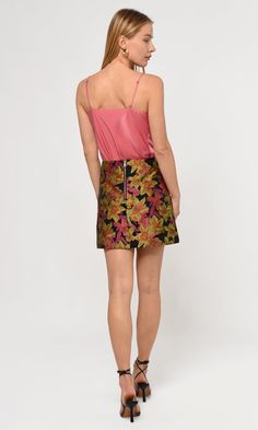 Crafted with a beautiful floral design, this skirt features a subtle side slit that allows for a comfortable fit and pairs perfectly with any blouse. Skirt Floral Mini Side slit Length: 16" Waist: 13 3/4" Self: 75% Polyester, 25% rayon Lining: 100% Polyester Hand wash with similar colors. Dry flat and iron low. Model is wearing size S Style #: G239S9312 Jacquard Skirt, Blouse Skirt, Skirt Floral, Denim Pant, Dress Romper, Sweater Skirt, Sweater Jacket, Modern Woman, Timeless Elegance