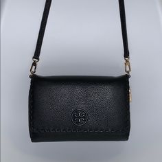 A Wallet Styled Cross Body Purse. Marion Flat Wallet Crossbody. Tory Burch. Used Only Once. Black Wallet With Gold-tone Hardware Crossbody, Black Crossbody Wallet With Gold-tone Hardware, Tory Burch Purse, Cross Body Purse, Black Purse, Tory Burch Bags, Tory Burch Bag, Black Purses, Wallet Fashion