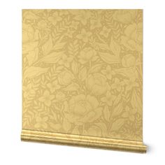 a gold wallpaper with flowers and leaves in the middle, against a white background