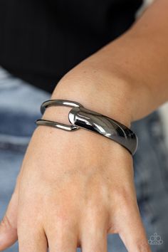 A flat gunmetal bar and airy gunmetal frame delicately overlap around the wrist, creating an oversized cuff-like bangle for a modern twist. Features a hinged closure. Sold as one individual bracelet. Black Bracelet, Couture Jewelry, Hinged Bracelet, Paparazzi Accessories, Black Bracelets, White Rhinestone, Silver Bars, Paparazzi Jewelry, Black Metallic