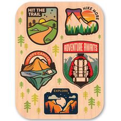 a wooden magnet with different stickers on it's back and the words adventure awaits