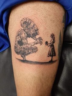 a person with a tattoo on their leg