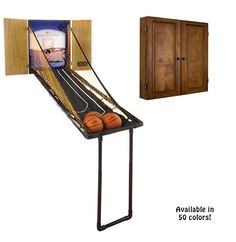 an image of a basketball game set up on a stand with the door open and ball in it