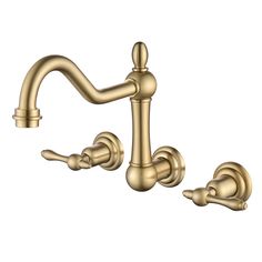 a golden faucet with two handles