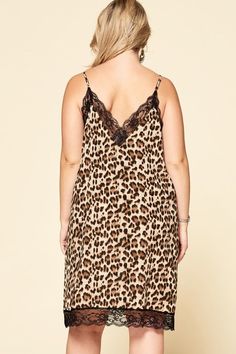 Leopard printed sleeveless slip dress featuring an adjustable spaghetti strap and eyelash ace edge trim. Leopard Print, Spaghetti Strap, Slip Dress, Spaghetti, Trim