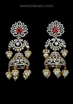 18 karat gold '4 in 1' detachable diamond jhumkas - diamond dangle earrings with color stones & Culture Pearls 
  this product has inter changeable stones in the earrings
  width of the jhumka : 0.75 inches 


Enhance Your Look with 18k Gold '4 in 1' Detachable Diamond Jhumkas    Indulge in luxury with these exquisite 18 karat gold '4 in 1' detachable diamond jhumkas from Totaram Jewelers. Handcrafted in India, these diamond dangle earrings are adorned with color stones and cultured pearls, addi Luxury Drop Chandbalis For Celebration, Luxury Chandbali Earrings With Cubic Zirconia, Real Diamond Earrings Kameswari Jewellers, Diamond Jhumkas, Color Stones, Diamond Dangle Earrings, Cultured Pearls, Stone Color, 18k Gold