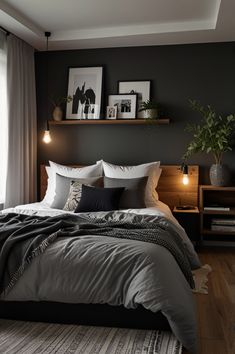 a large bed sitting in a bedroom next to a window with two framed pictures on the wall