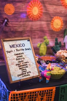 a mexican themed birthday party with food and decorations