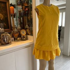 Vintage 60s 70s Canary Yellow Dress Cottagecore Dropwaist Pleated Vtg Glenbrooke Simply Stunning Please Feel Free To Make An Offer Or Bundle To Save !! Please Note This Item Is Vintage And We Suggest The Range Of Listed Sizes For Best Fit. Preowned, See Photos For Measurements Highend Estate, Rockabilly, Grunge, Prairie, Secretary, Pinup, Mod, Hippie, Floral Power, Party Dress, Off-White, Handmade, Custom, One Of A Kind, Mid Century Modern, Color Block, Unionmade, Cottoncore, Goth, Flowy, 3d, Ge Chic Lined Dresses For Vintage Fashion, Retro Fitted Mini Dress For Cocktails, Retro Knee-length Vintage Dress For Vintage Fashion, Retro Knee-length Ruffled Dress, Mod Spring Workwear Dresses, Retro Cocktail Mini Dress, 1970s Knee-length Vintage Fashion Dress, 1970s Knee-length Vintage Dress, 1970s Vintage Fashion Knee-length Dress