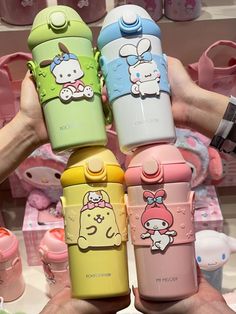 the hello kitty water bottles are on display