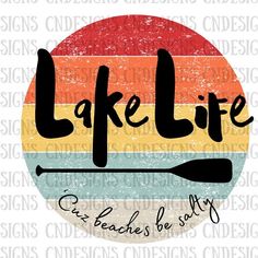 a colorful circle with the words lake life on it and an oar next to it