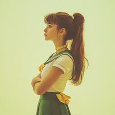 a girl in a school uniform is standing with her arms crossed and looking off to the side