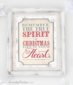 a framed christmas card with the words,'remember the true spirit of christmas lies in your heart '