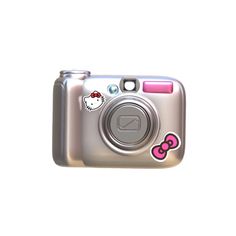 a silver camera with hello kitty stickers on it