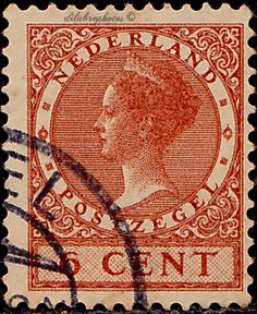 an old stamp with the image of queen elizabeth on it's front and side