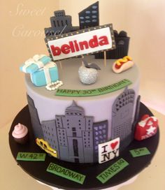 a birthday cake with the name belinda on top and decorations around it for someone's 30th birthday