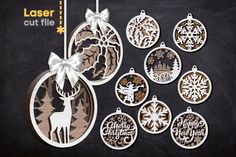 the laser cut christmas ornaments are ready to be hung on the chalkboard with ribbon