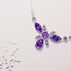 Introducing Blossom: Crafted as a romantic high-end floral necklace to complement any of our other pieces as a set or to shine brightly on it's own. This classical necklace is perfect for any occassion. As a gift for her, a supplement to an engagement ring or a gift for yourself - because you deserve it - it is guaranteed to impress. A bright and shiny string of simulated amethysts make this necklace stand out and is sure to bring lots of compliments. Each stone shines brightly to perfection and Elegant Clavicle Chain Jewelry Gift, Elegant Clavicle Chain Necklace For Gift, Elegant Clavicle Chain Jewelry As Gift, Elegant Clavicle Chain Necklace For Any Occasion, Elegant Clavicle Chain Jewelry, Elegant Clavicle Chain Necklace For Gift-giving Occasions, Elegant Sparkling Stones Jewelry Gift, Dazzling Necklaces With Sparkling Stones For Gifts, Purple Flower-shaped Jewelry For Weddings