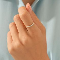 14k Solid Gold Dainty and Simple Design Curve Wedding & Stacking Ring for Women with Color Options. Half Eternity Stackable Arch Ring designed with a row of glittering cubic zirconias for a dash of sparkle. A chic ring with a unique design affording contemporary style. Ring Details ❥ Gold KT: 14k 18k 10k Solid Gold ❥ Gold Color Options: Yellow Gold, White Gold, Rose Gold ❥ Band Width: 1.40 mm ❥ Thickness: 1.20 mm ❥ Gemstone: AAA Grade White Cubic Zirconia ❥ Ready to Ship 4-7 Business Days MORE F Stackable Wedding Rings With Baguette Diamonds, Baguette Wedding Ring, Arch Ring, Baguette Wedding Rings, Contour Ring, Chic Rings, Rose Gold Band, Ring Minimalist, Cz Ring