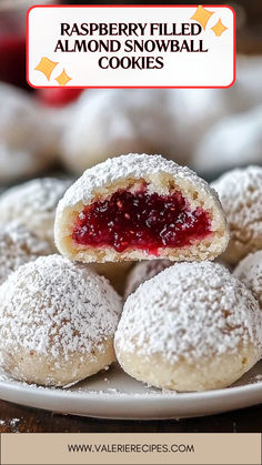 Snowballs just got a fruity twist! These Raspberry Almond delights are the ultimate treat to cozy up with this season. ❄️🍓 #SnowballCookies #RaspberryFilling #AlmondDream #SweetSurprise #HolidayDesserts #CozyCookie #FruityDelight #SeasonalSweet #BakingJoy #WinterDessertGoals Raspberry Filled Snowballs, Raspberry Almond Filled Snowball Cookies, Jam Filled Snowball Cookies, Raspberry Almond Snowball Cookies, Raspberry Filled Snowball Cookies, Raspberry Filled Almond Snow Cookies, Raspberry Snowball Cookies, Almond Joy Balls, Mini Raspberry Almond Tarts